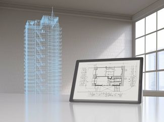 Virtuelle Planung der Infrastruktur neben dem Tablet